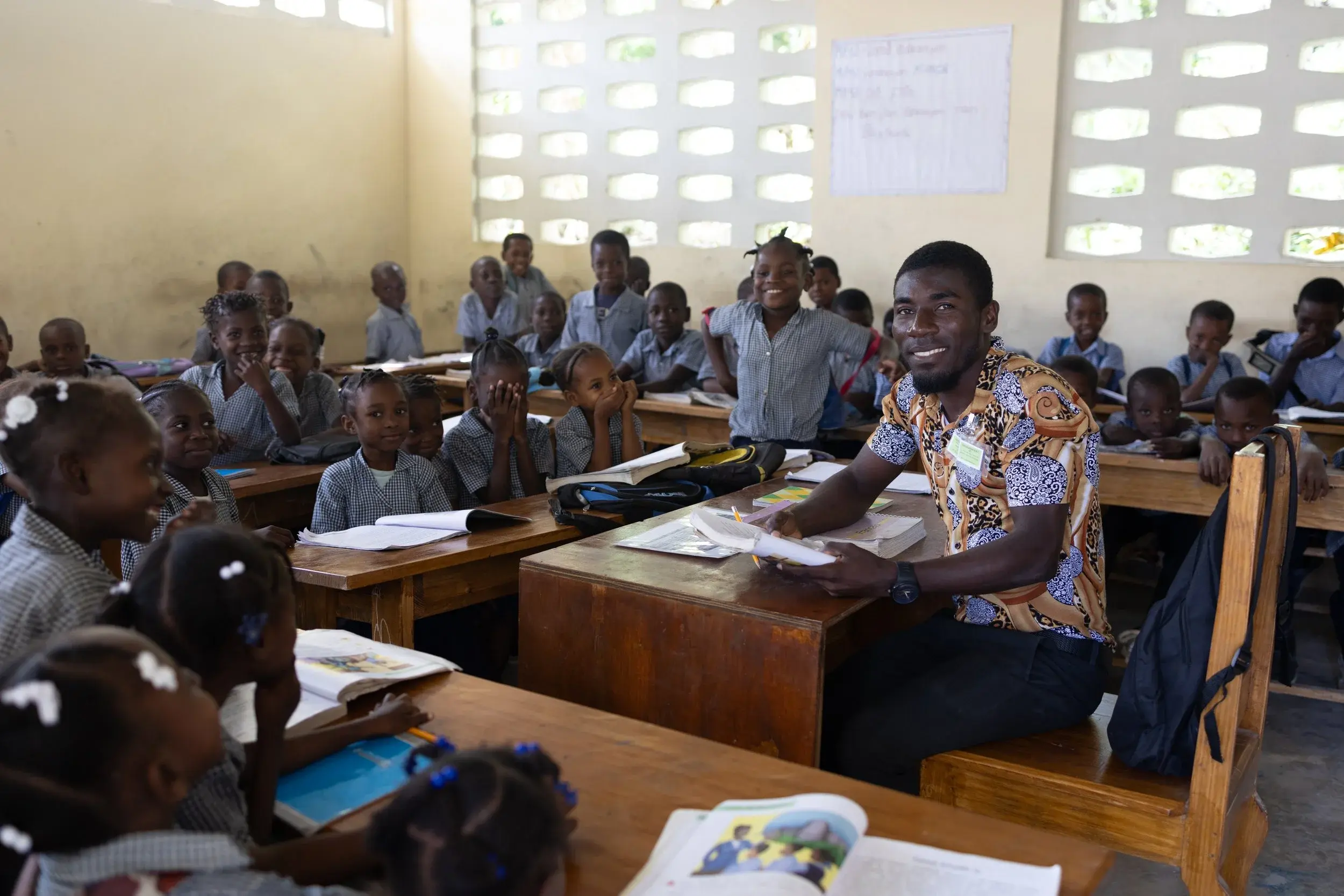 Teacher with students in classroom